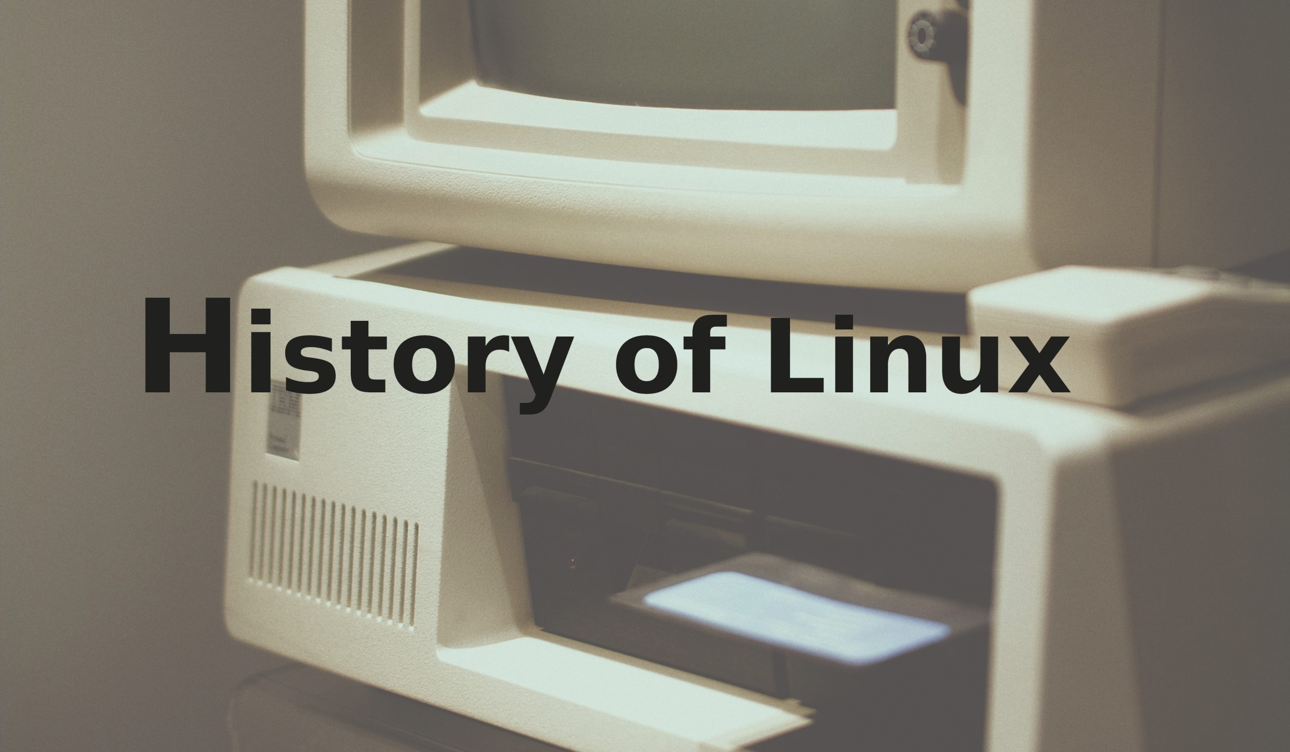 Old computer with heading History of linux